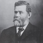 Hon John Lewis CMG