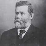Hon John Lewis CMG